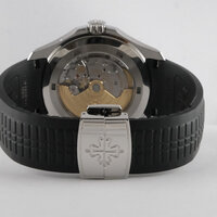 Patek Philippe · Aquanaut Travel Time — 5 / 9 Patek Philippe · Aquanaut Travel Time — 5 / 9