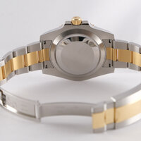 Rolex · Submariner — 7 / 8