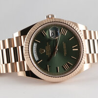 Rolex · Day-Date Rotgold 40 mm — 8 / 9
