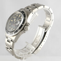 Rolex · Submariner Rotschrift — 6 / 7