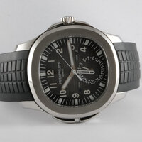 Patek Philippe · Aquanaut Travel Time — 9 / 9 Patek Philippe · Aquanaut Travel Time — 9 / 9