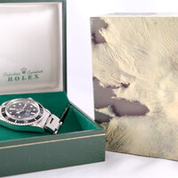 Rolex · Submariner — 6 / 9