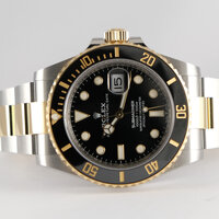 Rolex · Submariner Date — 9 / 9 Rolex · Submariner Date — 9 / 9
