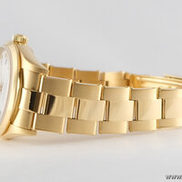 Rolex · Oyster Perpetual — 8 / 9