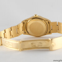 Rolex · Oyster Perpetual — 7 / 9