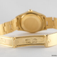 Rolex · Oyster Perpetual — 6 / 9