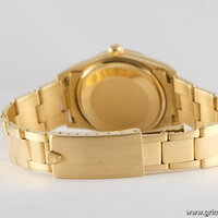 Rolex · Oyster Perpetual — 5 / 9