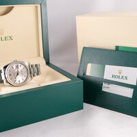 Rolex · Date — 3 / 9