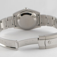 Rolex · Date — 4 / 9