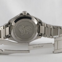 TAG Heuer · Aquaracer GMT — 7 / 8