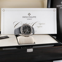 Patek Philippe · Aquanaut Travel Time — 3 / 9 Patek Philippe · Aquanaut Travel Time — 3 / 9