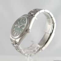 Rolex · Oyster Perpetual 41 — 3 / 8